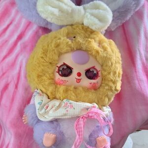 Charming Plush Doll with Yellow and Purple Fur